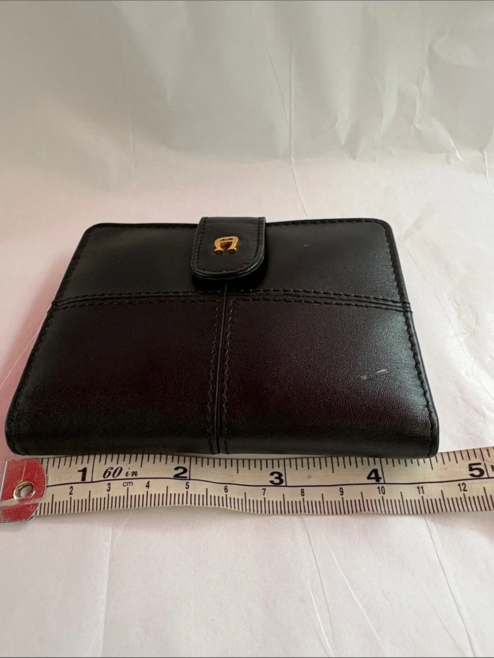 Compact Black Leather Women's Wallet with Snap Tab Etienne Aigner.
